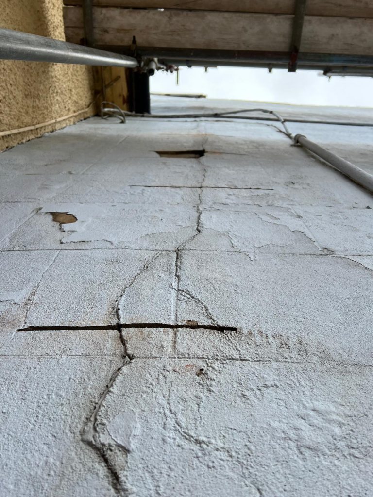 Cracked wall with visible damage