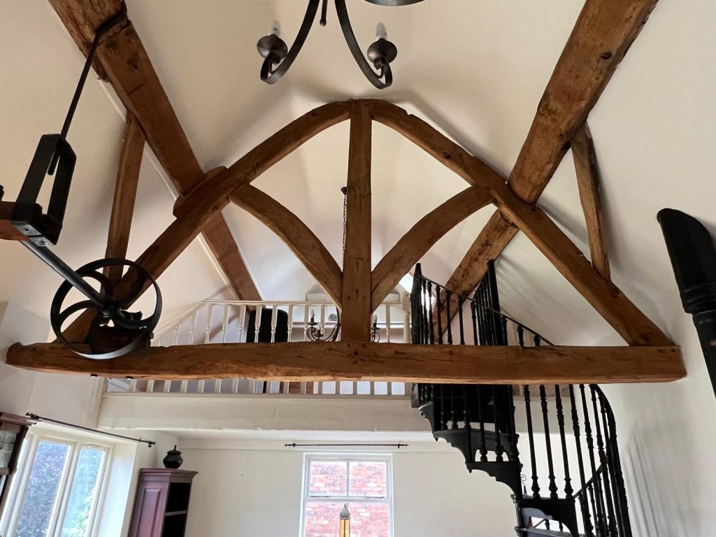 Wooden beams and spiral staircase